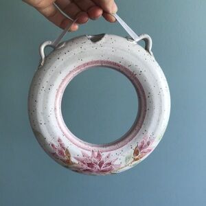 Studio pottery vase hanging circular donut vase. Hand painted. Signed. Floral